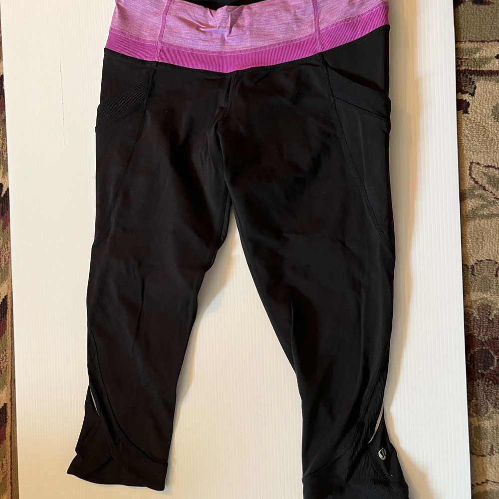 Lululemon Athletica Black and Pink Cropped Pants